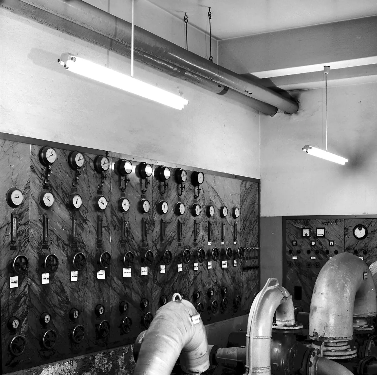 Mechanical room with boiler and heating pipes